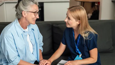 Community Health Worker visits woman at home for health consultation and support