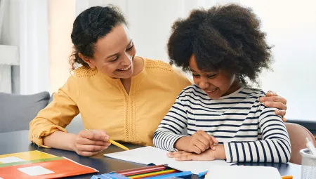Professional female psychologist works with little girl